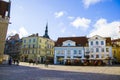 People in the street, tourist walking scene, buildings and architecture exterior view in old town of Tallinn Royalty Free Stock Photo