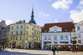 People in the street, tourist walking scene, buildings and architecture exterior view in old town of Tallinn Royalty Free Stock Photo