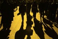 People on the street. Urban crowd in yellow tone