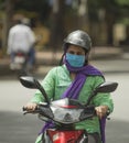 People on the streets of India wearing a coronavirus protection mask. New normal