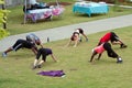 People Stretch Following Fitness Boot Camp Workout