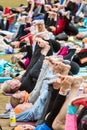 People Stretch Legs In Huge Atlanta Outdoor Group Yoga Class