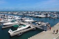 People stroll along 31st Street Harbor boardwalk on Lake Michigan in Chicago