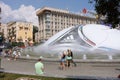 People strolling on the background of UEFA ball