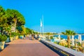 People are strolling on boulevard de la croisette in cannes, France