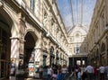 People strolling through the Galeries Royales Saint-Hubert