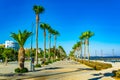 People are strolling on Molos promenade on Limassol, Cyprus