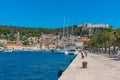 People are strolling at waterfront of Hvar town in Croatia