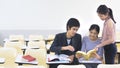 People student read book and talk in lecture chairs classroom