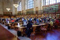 People study quietly in the library.