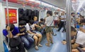 People at a subway train in Beijing, China