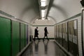 People in subway underground tunnel in Paris Royalty Free Stock Photo