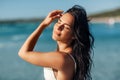 smiling young woman in bikini swimsuit on beach Royalty Free Stock Photo