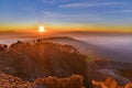 People on the summit of volcano Rinjani watching sunrise, Lombok Royalty Free Stock Photo