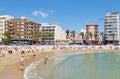 People sunbath swim at Playa del Cura beach, Torrevieja, Spain Royalty Free Stock Photo