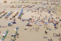 People sunbathe at Praia da Rocha beach in Portimao, Portugal.