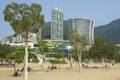 People sunbathe at the Stanley town beach in Hong Kong, China.