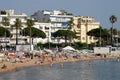 People sunbathing Cannes Beach