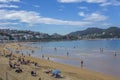 People sunbathing in La Concha Beach