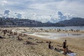 People sunbathing in La Concha Beach