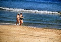 People sunbathing and relaxing in a Sunny day on the beach Royalty Free Stock Photo