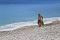 People sunbathing and relaxing on a Sunny day on the beach Royalty Free Stock Photo