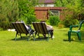 People sunbathing in a garden Royalty Free Stock Photo