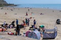 People on Sunny sands beach enjoying the beautiful sunshine