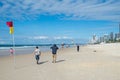 People on Surfers Paradise beach on the Gold Coast. Royalty Free Stock Photo