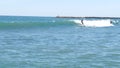 People surfing, surfers swimming in ocean water, men waiting sea wave on surfboard, California USA