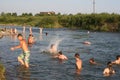 People swim in the river