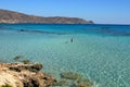 People swimming in the clear blue sea of Elafonissi beach nature reserve Crete