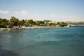 People swimming and kayaking at Andreas & Melani beach in a summer season, Cyprus