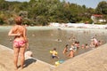 People swimming in public pool