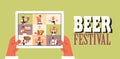 People on tablet screen celebrating Oktoberfest party beer festival online communication concept Royalty Free Stock Photo