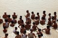 People take bath in the Holy river Ganges in Assi Ghat