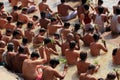People take bath in the Holy river Ganges in Assi Ghat