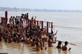 People take bath by jumping in to the Holy river Ganges in Assi Ghat