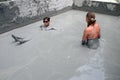 People take a mud bath with blue clay Royalty Free Stock Photo