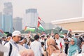 People take part in a protest in support of Palestinians following the conflict between Israel and Hamas in Monas