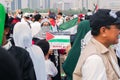 People take part in a protest in support of Palestinians following the conflict between Israel and Hamas in Monas