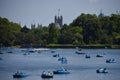 People in pedal boats on The Serpentine lake in Hyde Park, London, UK