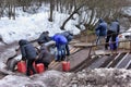 People take water from the spring