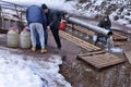 People take water from the spring