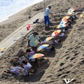 People taking a bath of hot sand in Kagoshima beach Royalty Free Stock Photo