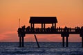 People taking pictures and enjoying sunset at Pier 60 at Clearwater Beach