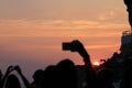 People taking pictures to dramatic sunset in Minorca Royalty Free Stock Photo
