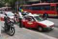 People taking a taxi on street in Kuala Lumpur, Malaysia