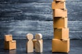 People talk near the tower of cardboard boxes. Services transportation delivery of goods. Online shopping. Concept of business Royalty Free Stock Photo