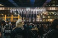 People talking photos of Bit.fall installation by Julius Popp in Canary Wharf, London, UK